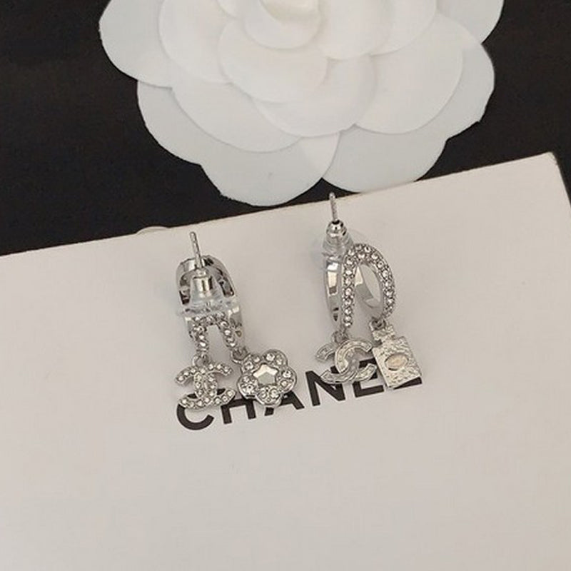 18K  Chanel Flower Diamond Earrings
