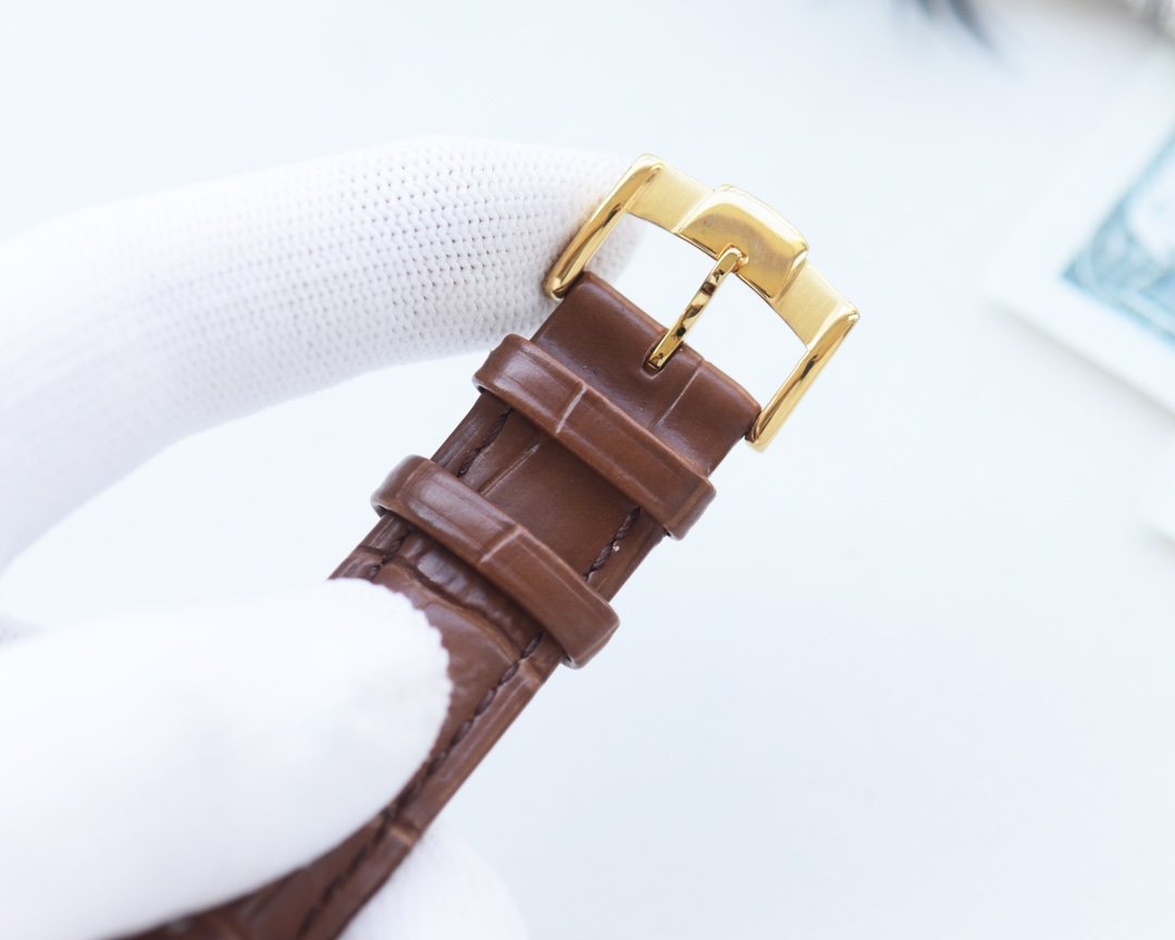 Patek Philippe Gold Dial Brown Strap Watch